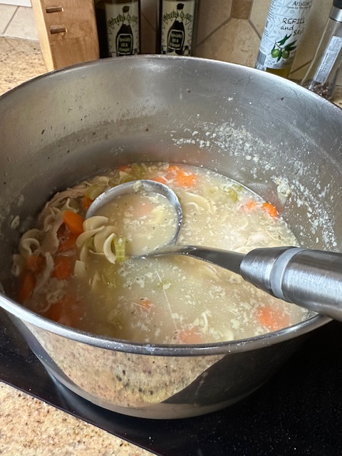Pot of chicken noodle soup 