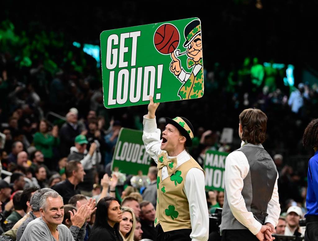 Dec 8, 2023; Boston, Massachusetts, USA; Boston Celtics mascot Luck encourages the fans during the second half against the New York Knicks at TD Garden. Credit: Eric Canha-USA TODAY Sports