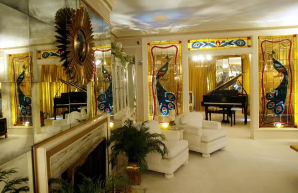 Elvis Presley's living room at Graceland is seen during Elvis Week on August 12, 2002 in Memphis, Tennessee. 75,000 fans are expected to attend the celebration of all things Elvis which this year marks the 25th anniversary of Presley's August 16, 1977 death.